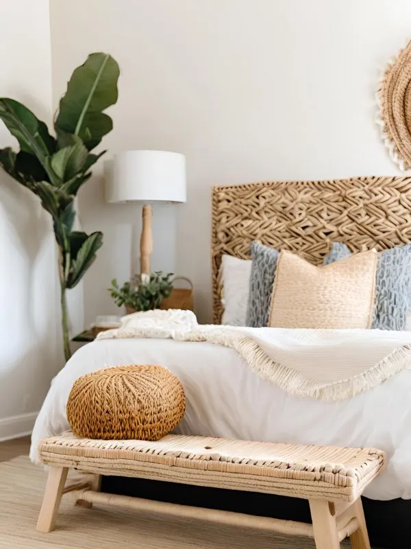 Woven Bench at the Foot of the Bed for Boho Farmhouse Bedroom