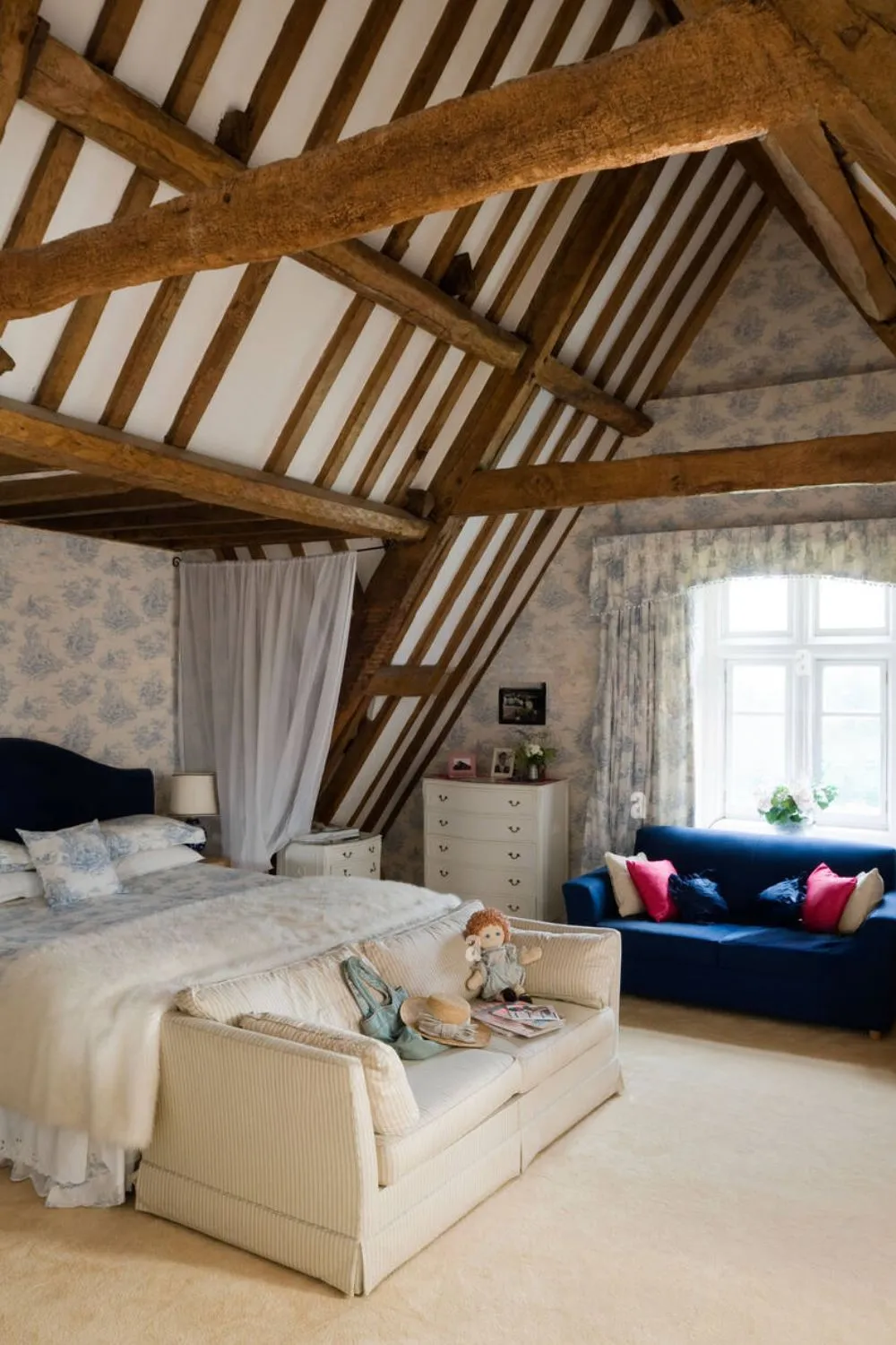 Highlight Exposed Beams for Small Attic Bedroom