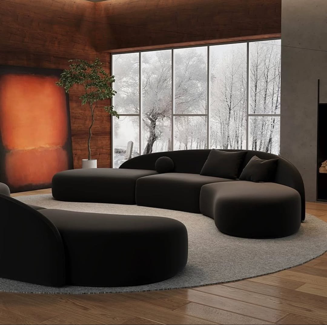 Curved Furniture Lines Dark Feminine Living Room