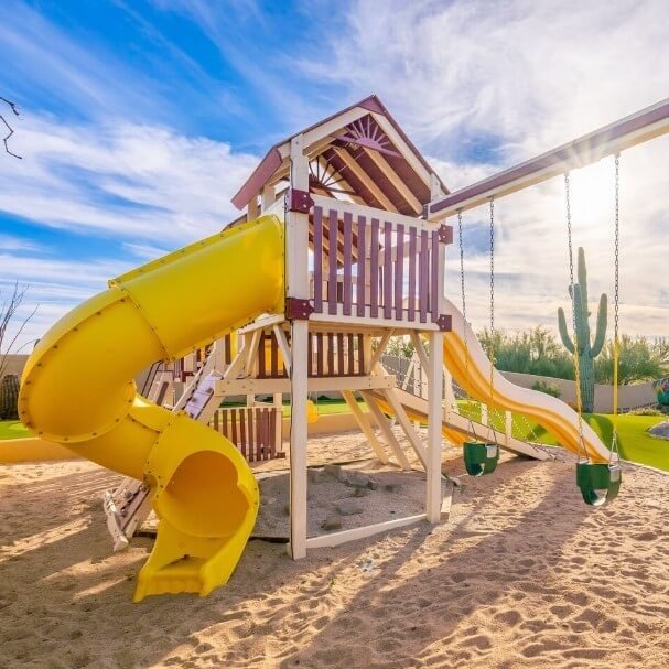 1. Compact Playsets with Slides and Swings