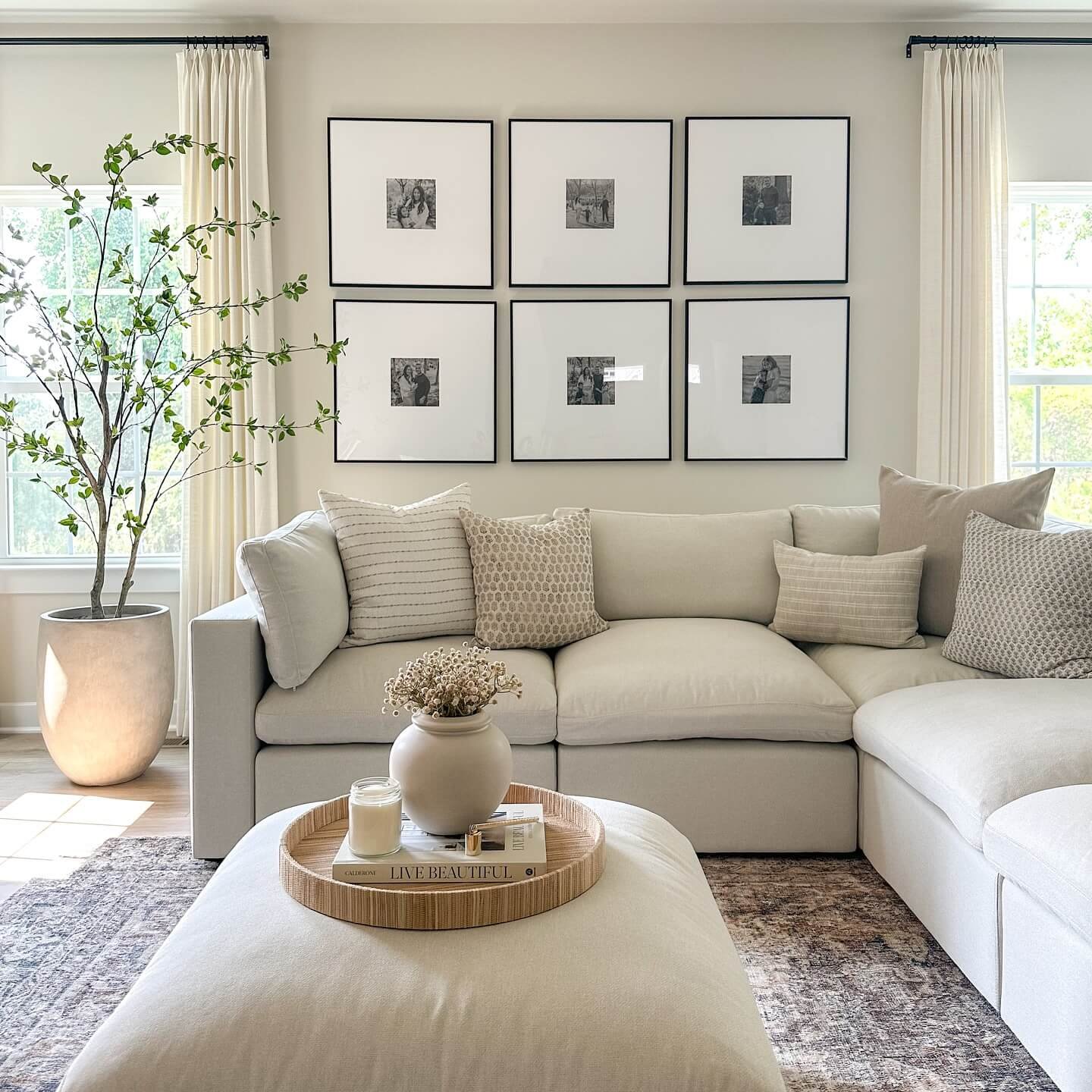 Elegant Neutral Gallery with Stunning Entryway Gallery Wall