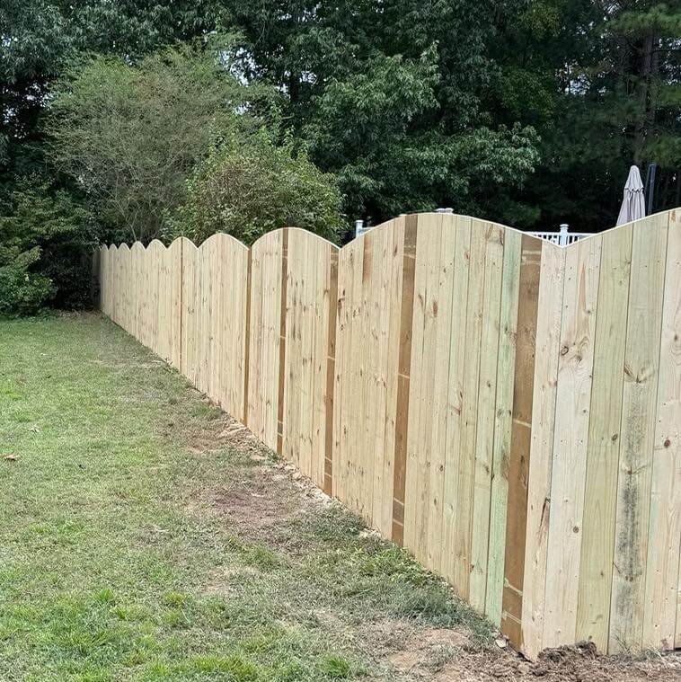 12. Scalloped Top Fence for Gentle Visual Interest