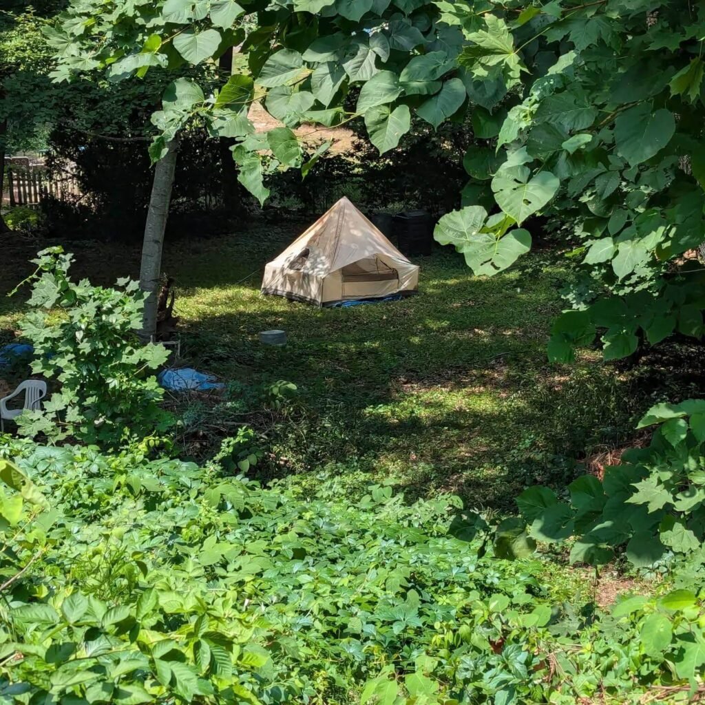 12. Tuck the Tent Into a Hidden Garden Spot