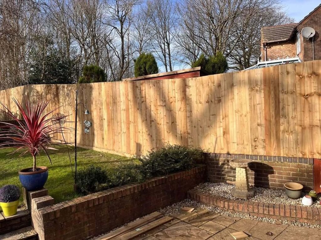 13. Curved Garden Fence for Sloped Yards