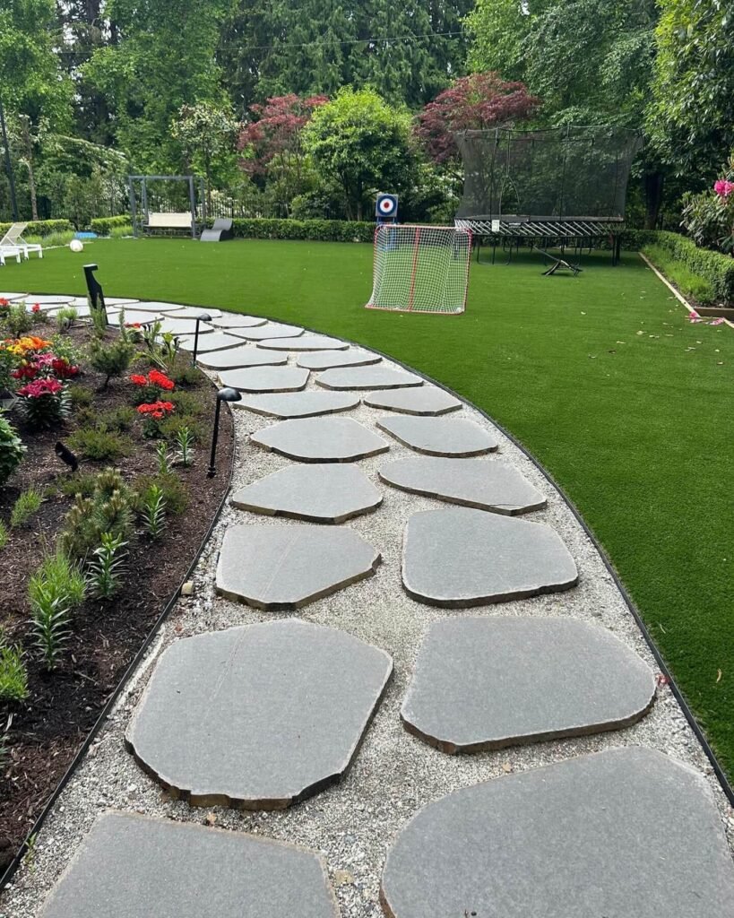 14. Curved Stone Pathway in a Multi Functional Backyard