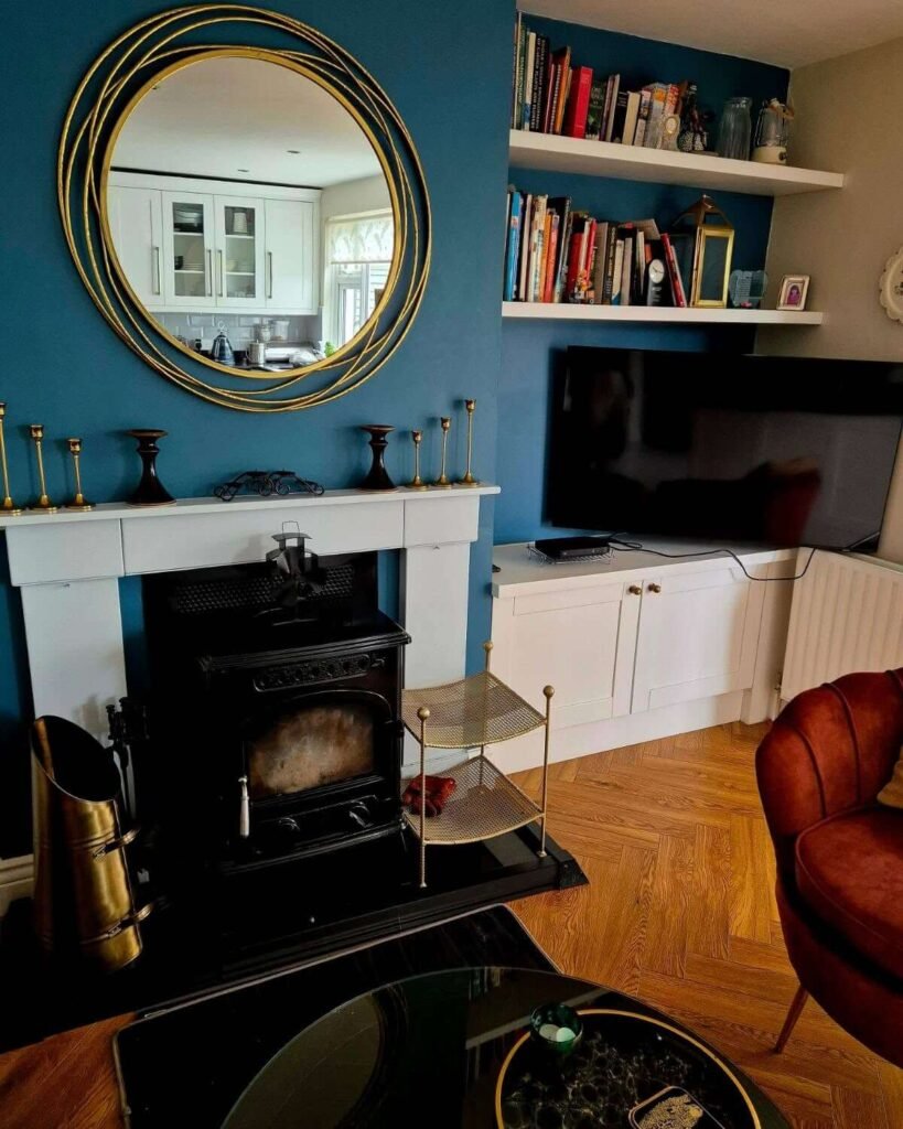 15. Deep Blue for a Statement Fireplace Wall