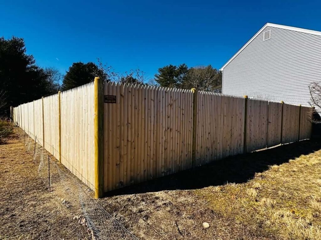 15. Pointed Stockade Fence for Enhanced Security