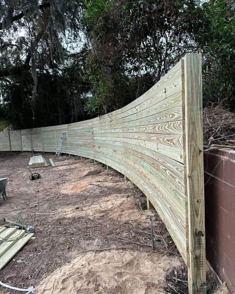 16. Curved Horizontal Fence for Contemporary Appeal