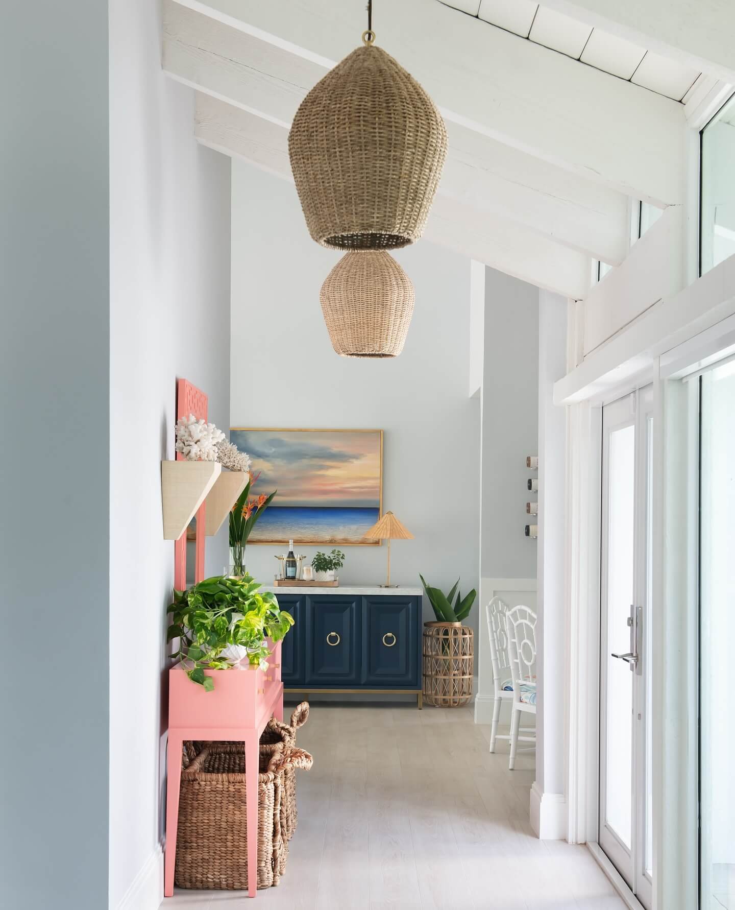 Bold Color Pops in Stunning Entryway Gallery Wall