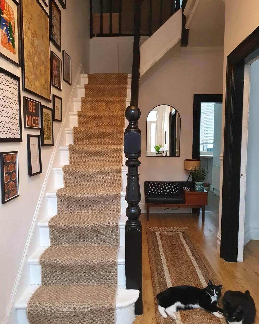 Minimalist and Clean Gallery Wall Along the Stairs