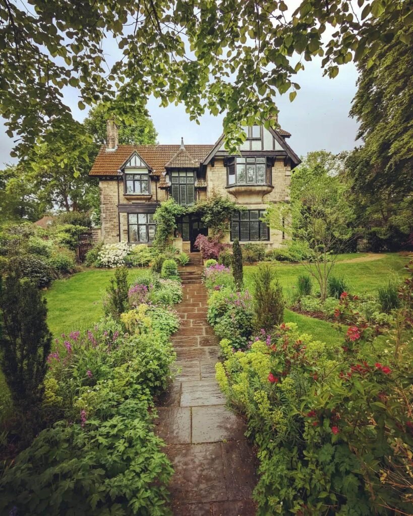 22. Lush Woodland Garden with a Narrow Stone Trail