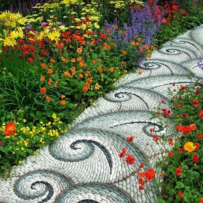 22. Pebble Mosaic Pathway with Artistic Swirls