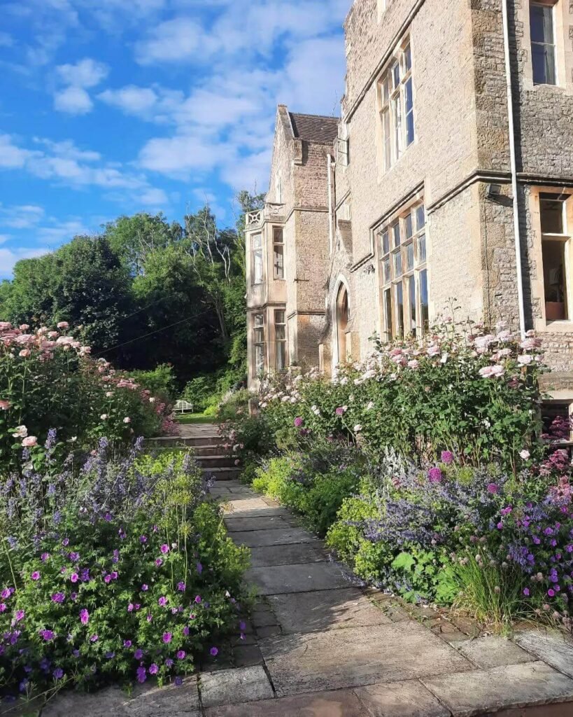 23. English Manor Style with Layered Cottage Blooms
