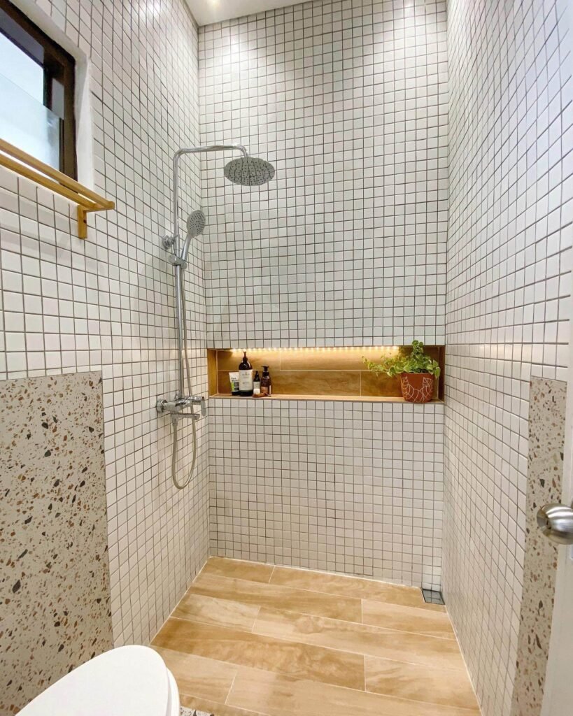 24. Create a Spa Vibe with Walk In Showers and Niches