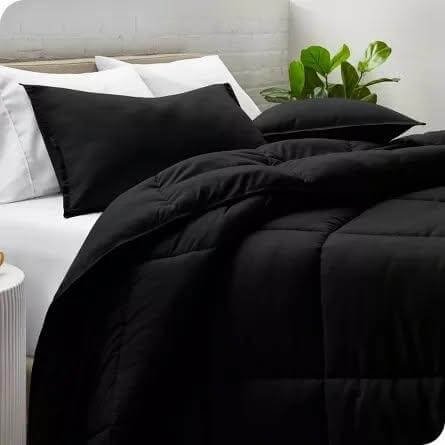 3. Sleek Simplicity with Minimalist Black Bedding