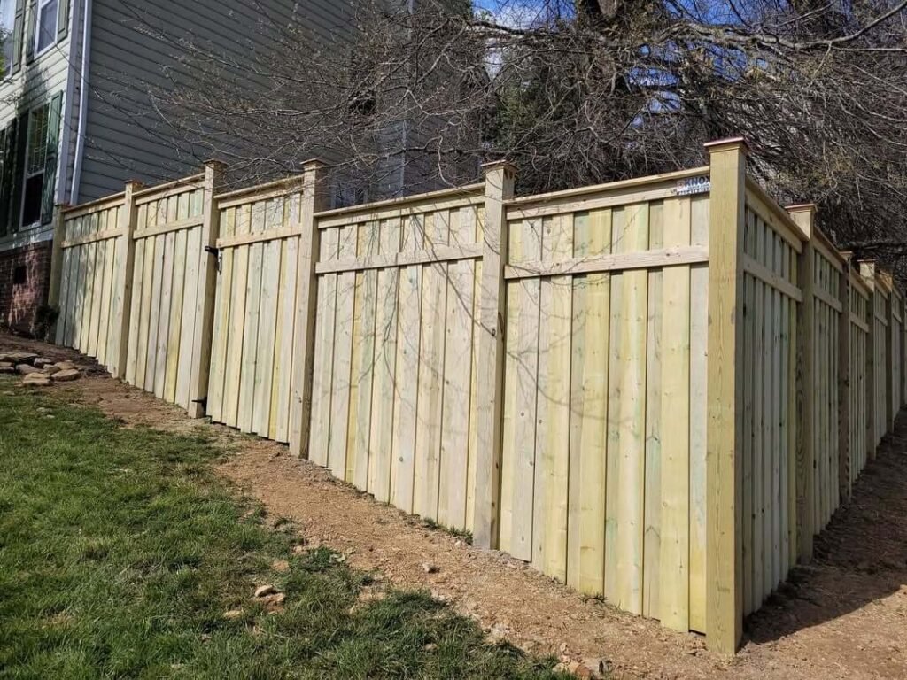 3. Craftsman-Inspired Fence with Decorative Caps