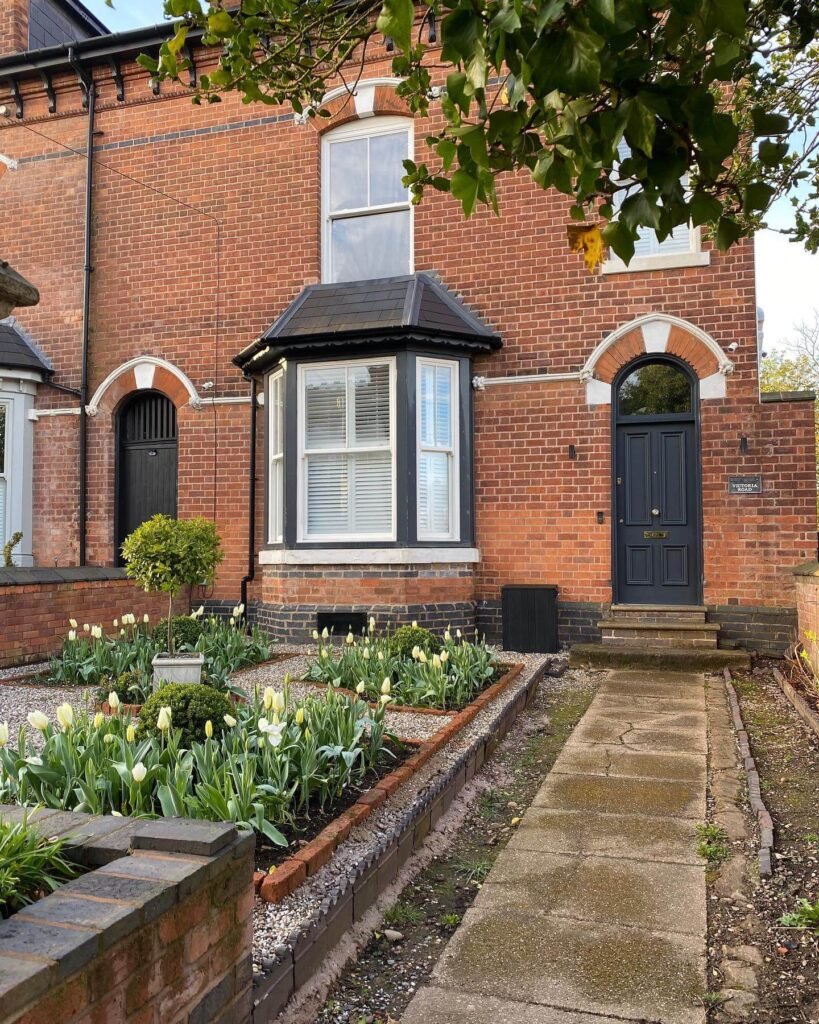 5. Cottage Garden with a Rustic Concrete Path