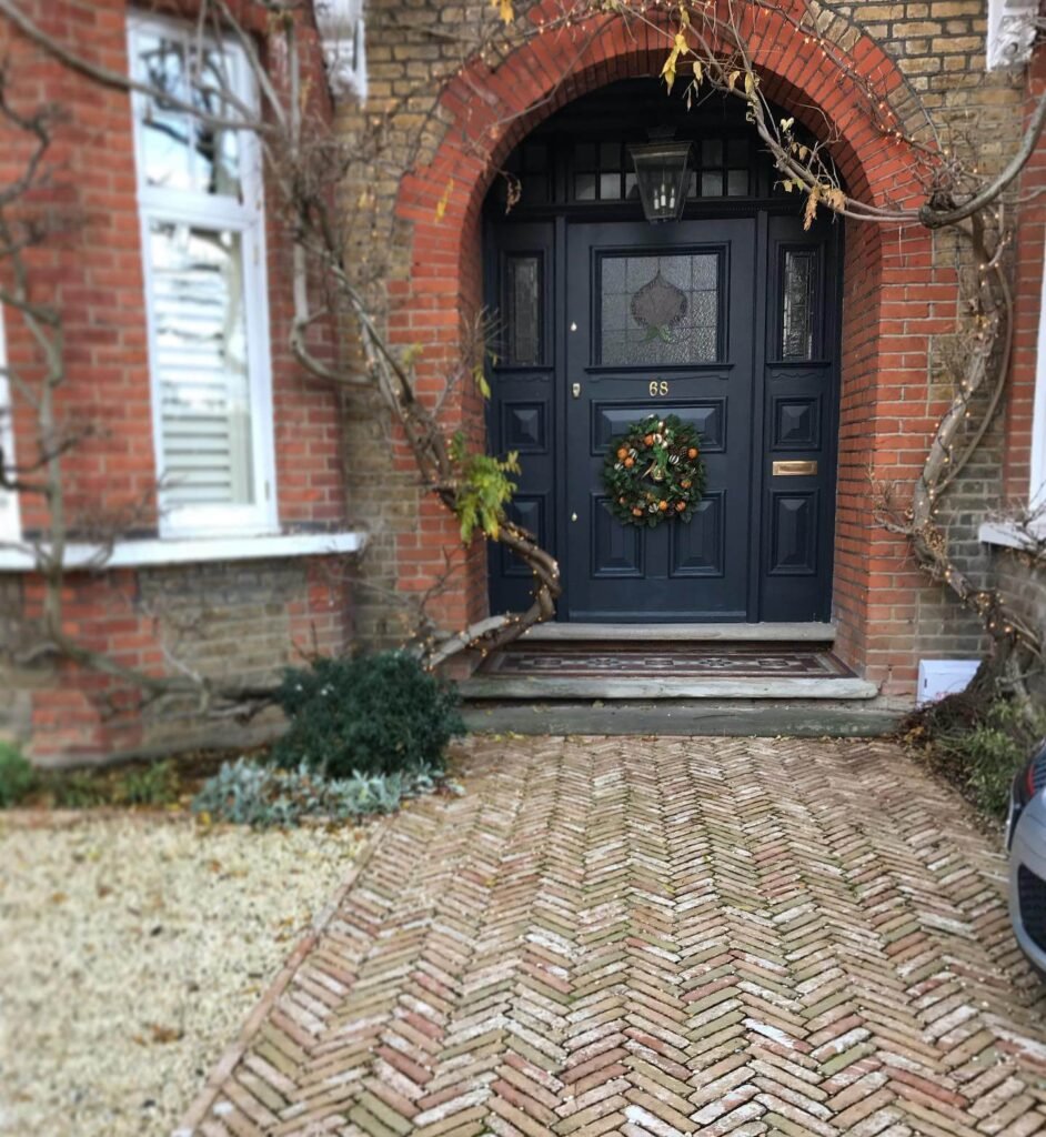 6. Herringbone Brick for Classic Curb Appeal
