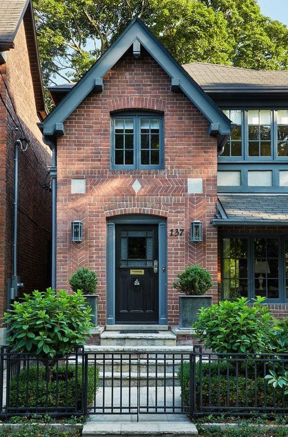 Navy Blue Entryway Tan Brick House Exterior