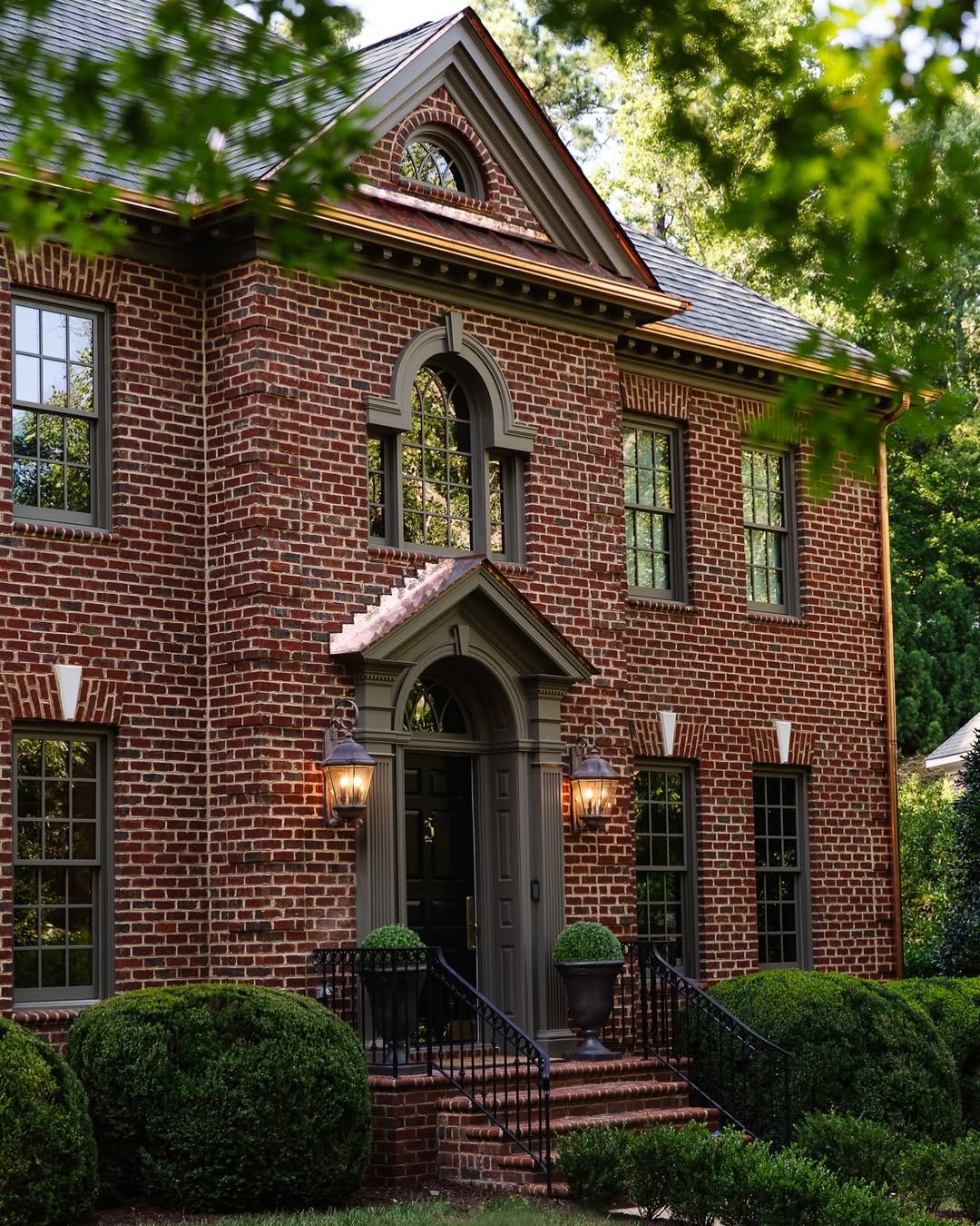 Red Roof Tan Brick House Exterior