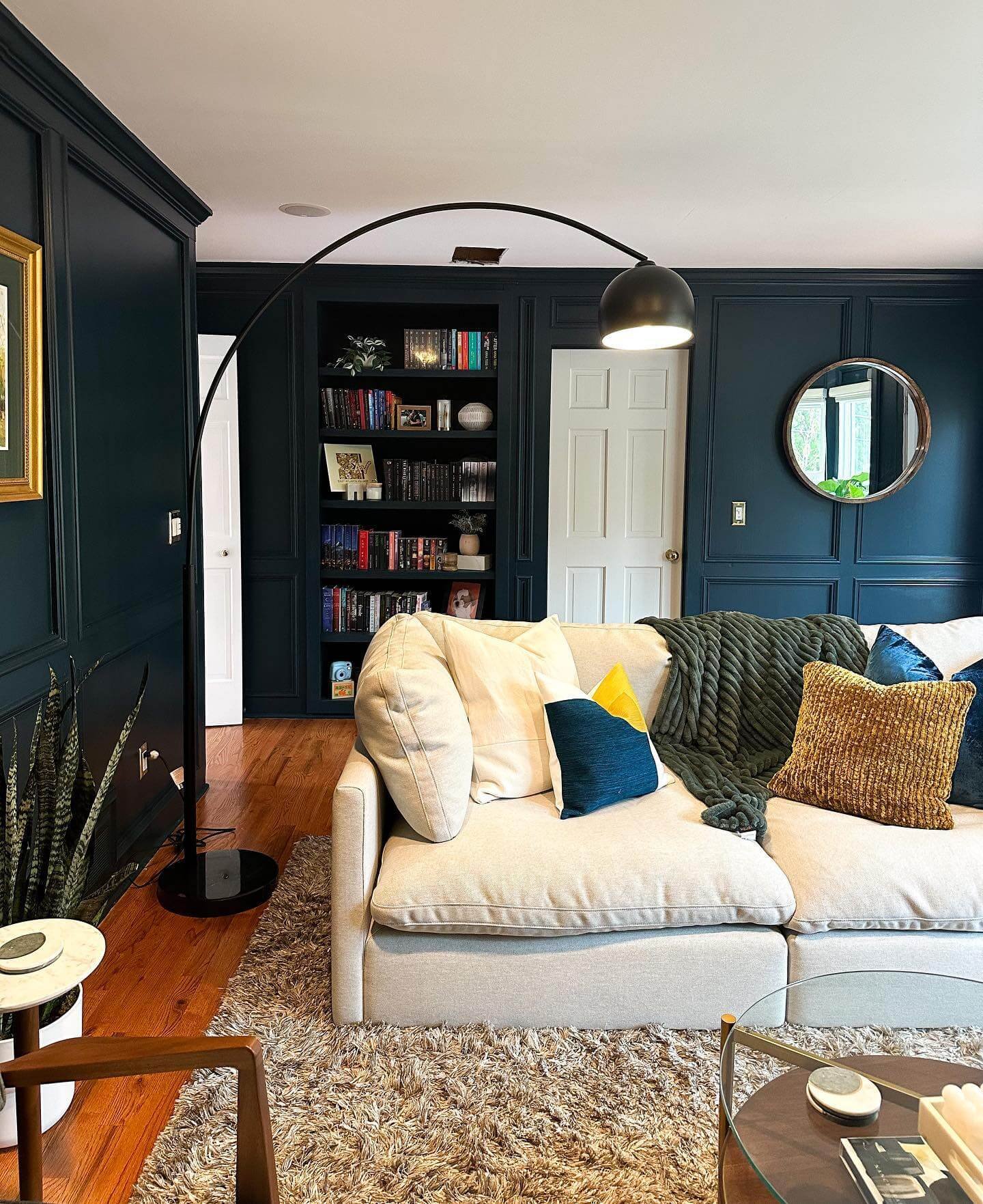 Bold Blue Walls with Moody Living Room
