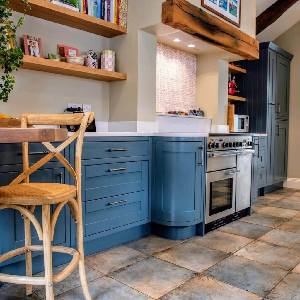 Above Kitchen Cabinet Decor Curated Display with Books and Art