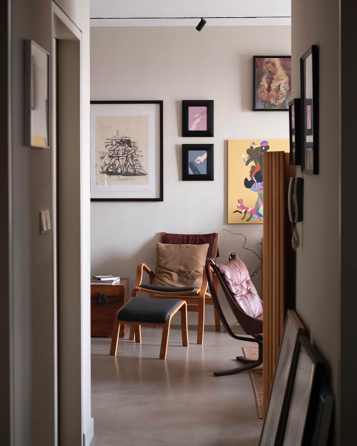 Mood with Bold Art and Cozy Seating Moody Living Room