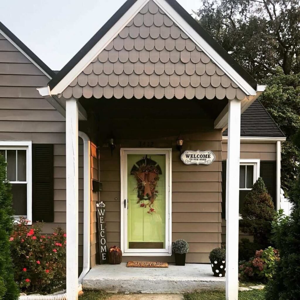 11. Simple Fall Porch with a Touch of Whimsy