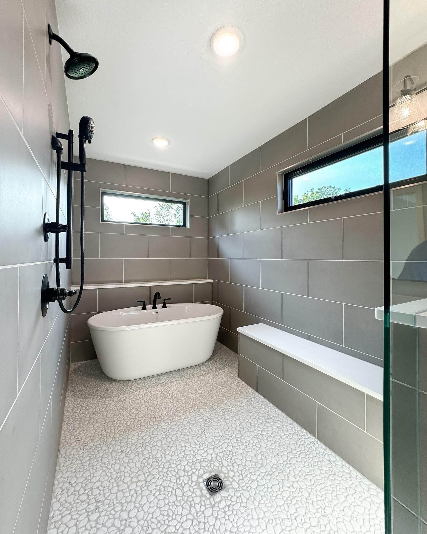 Earthy Contrast with Pebble-Tiled Personality