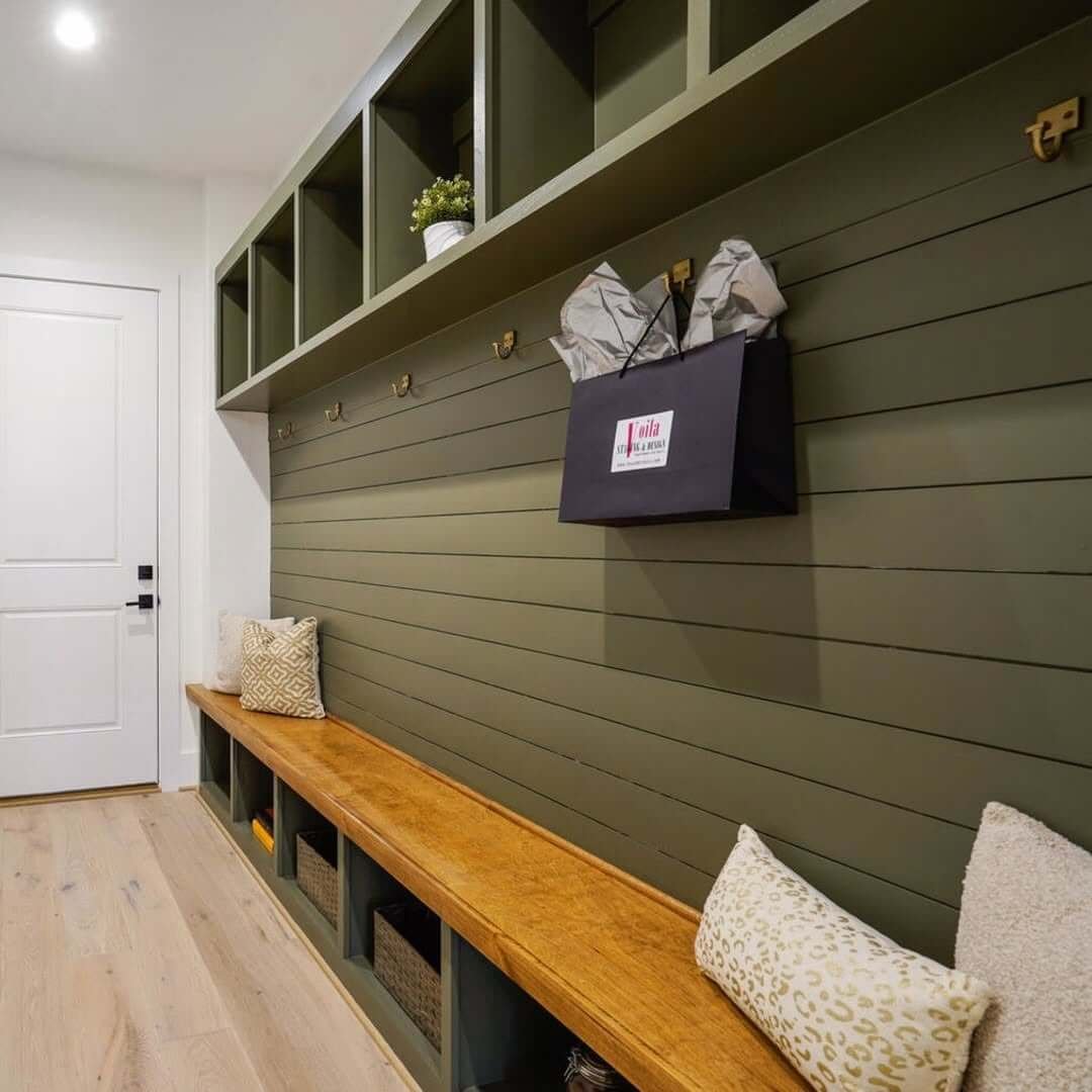 Green Accent Wall and Open Shelving for Mid-Century Modern Mudroom