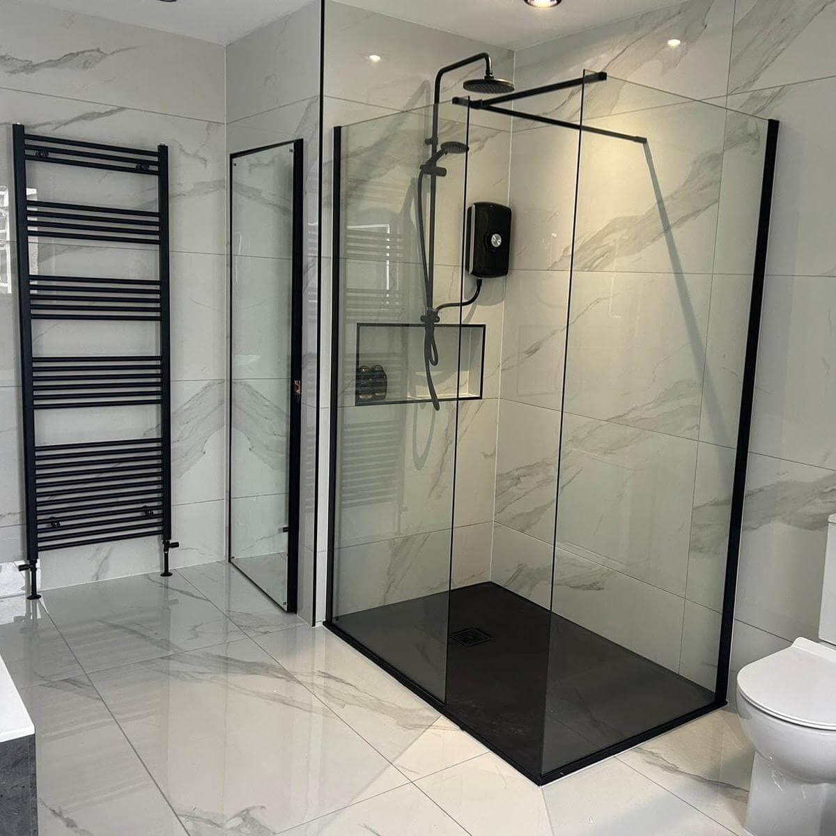 Black Framed Boldness in Marble-Look Tile