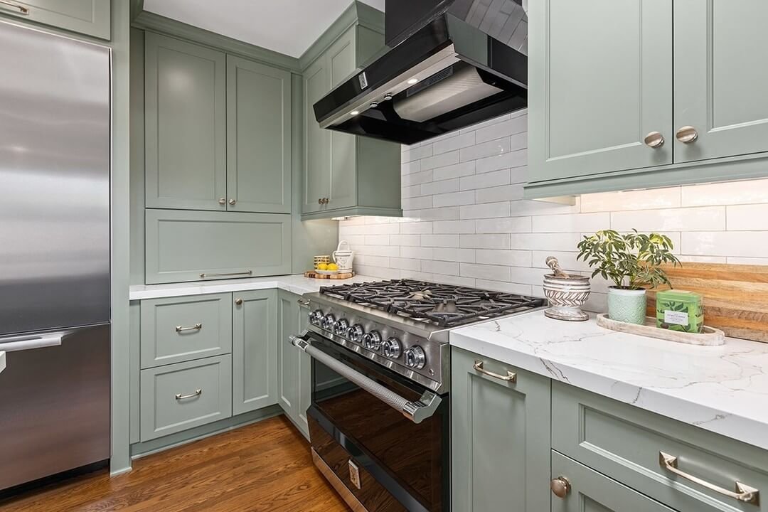 Soft Sage Cabinets with Traditional Style Kitchen