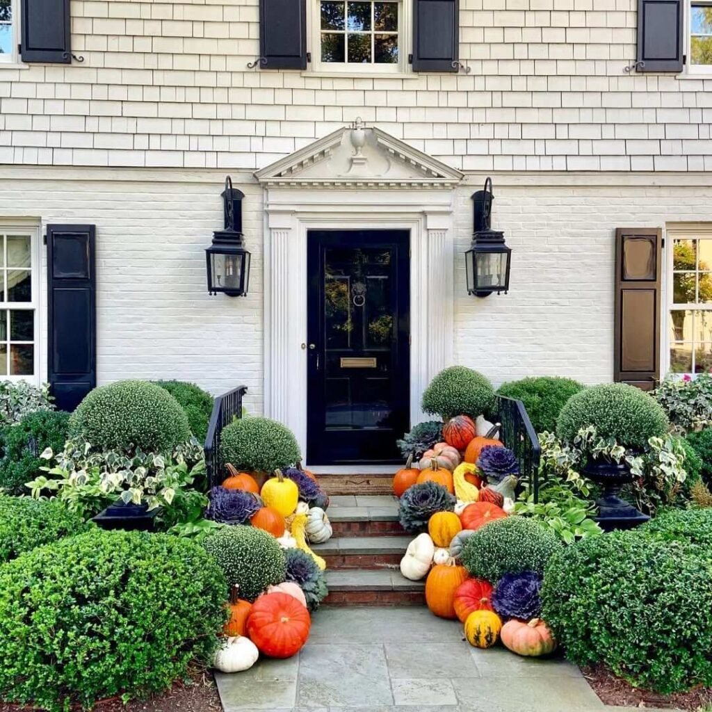 16. Classic Colonial Elegance with a Pumpkin Lined Pathway