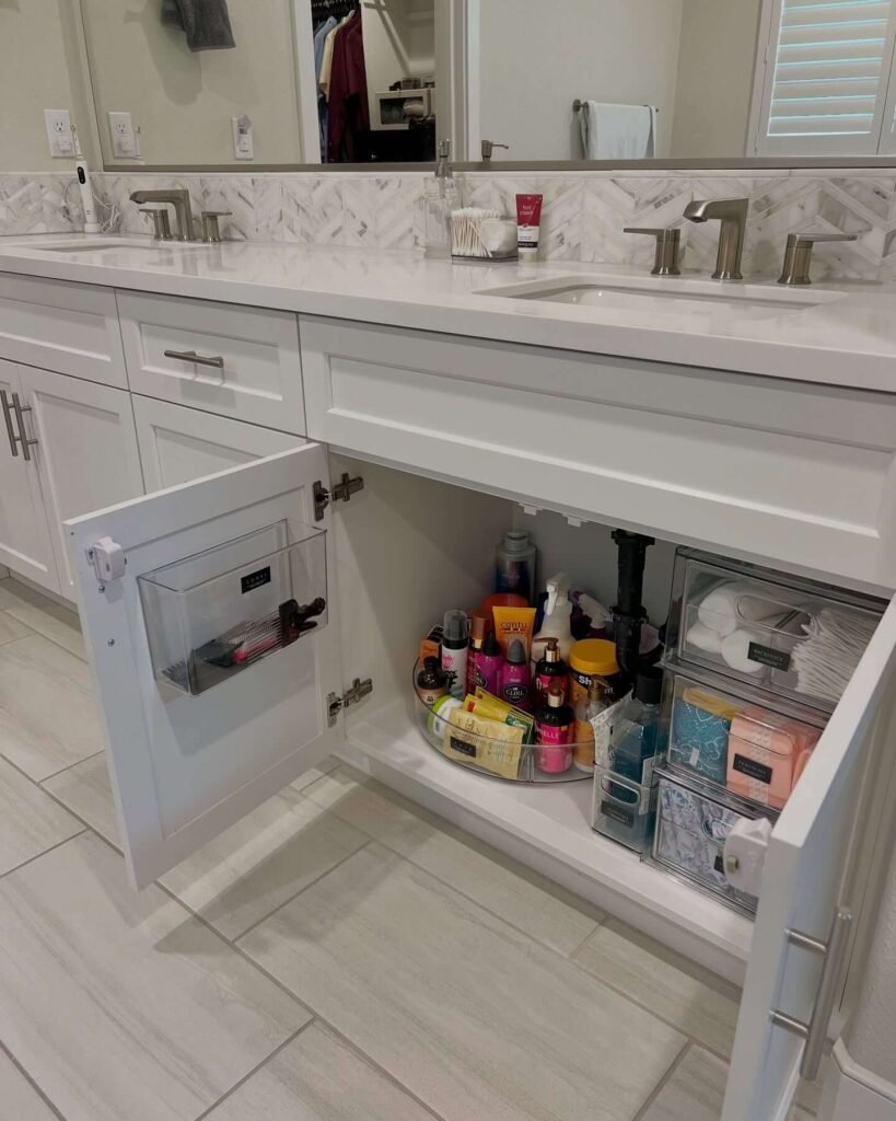 16. Utilize Lazy Susans for Easy Under Sink Access