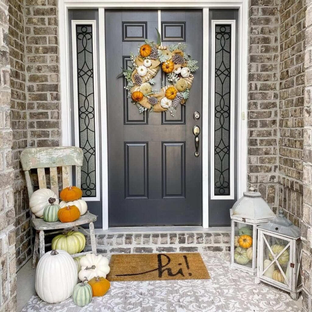 19. Neutral Toned Pumpkin Porch with Whimsical Wreath