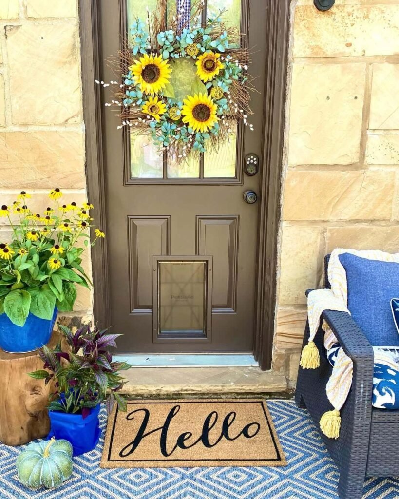 4. Bright and Cheerful Fall Decor with Sunflowers and Blue Accents