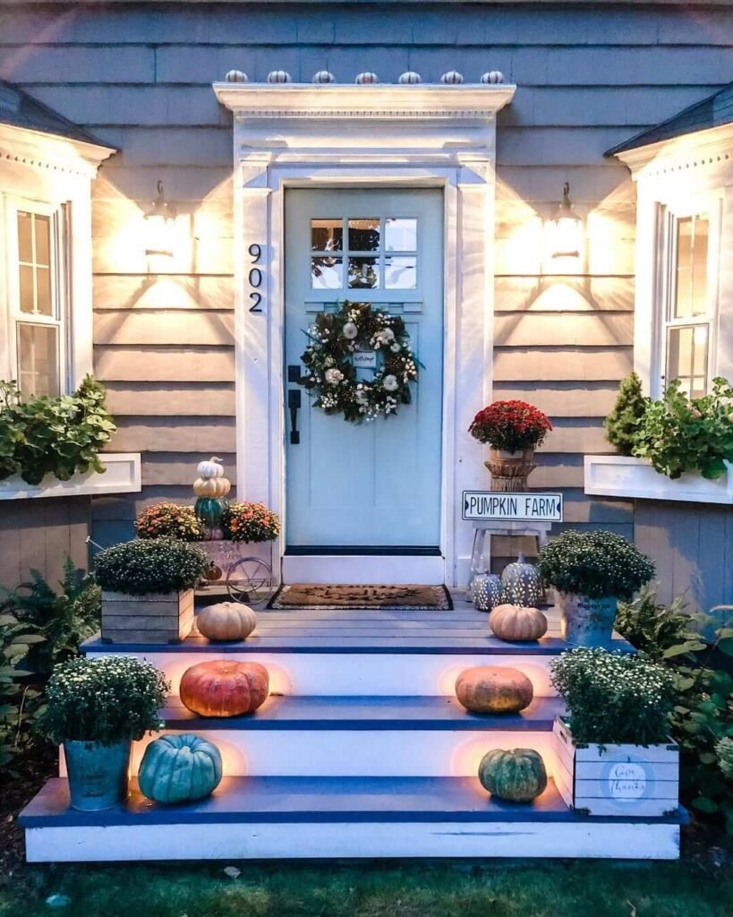 9. Whimsical Pumpkin Farm Porch with Glowing Steps