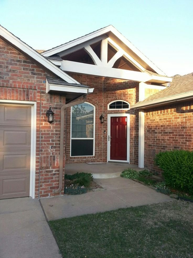 Classic White Trim with Orange Brick Orange Brick Exteriors