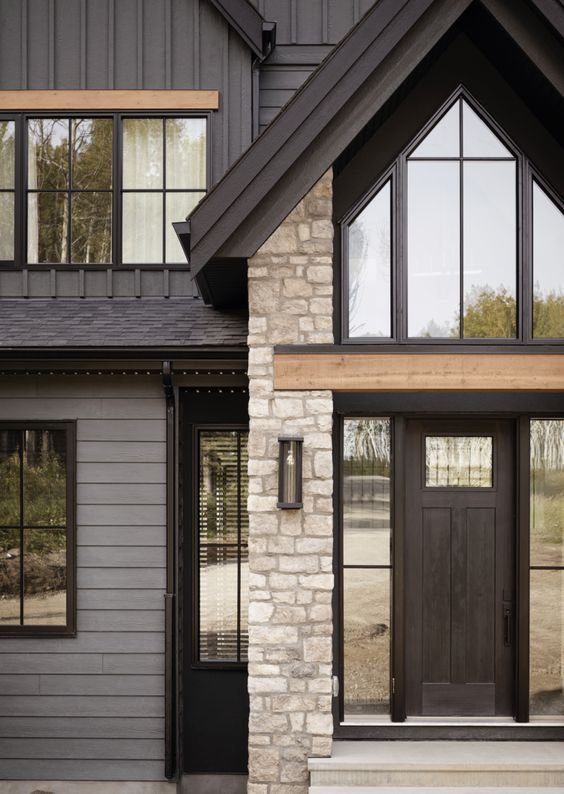 Farmhouse Exteriors Rustic Grey Siding with Black Accents