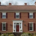 red brick farmhouse exterior